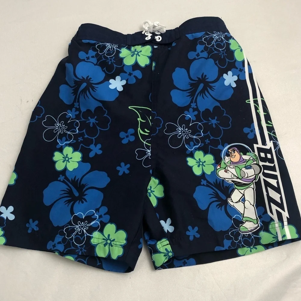 Disney blue green hibiscus print Buzz Lightyear mesh lined swim trunks M